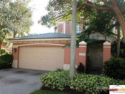 Two car garage with electronic door lift.