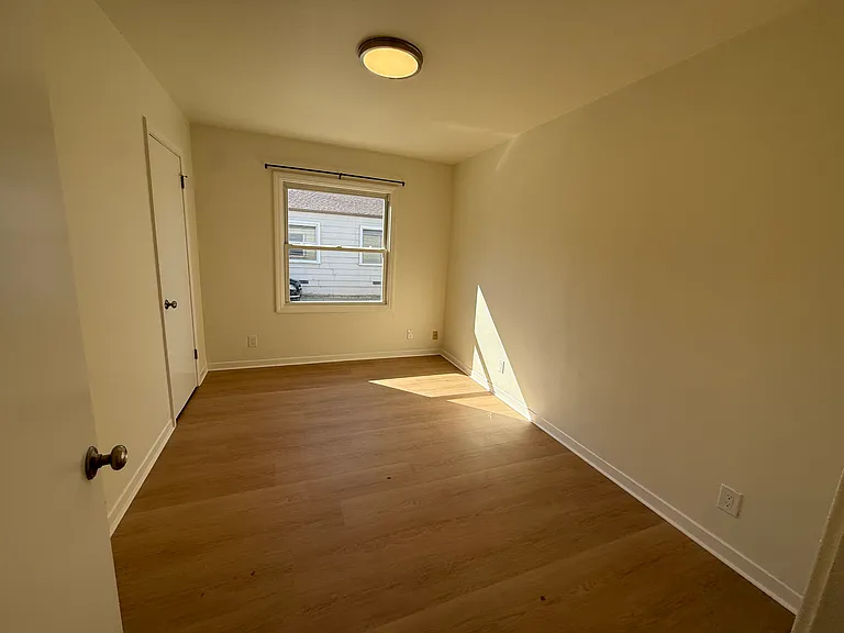 Bedroom #2 is cozy with a single door closet.