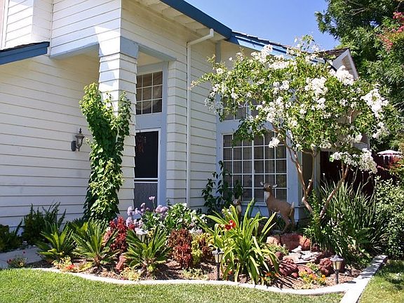 Great curb appeal, lovingly landscaped.