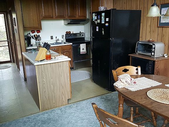 Front door and kitchen.