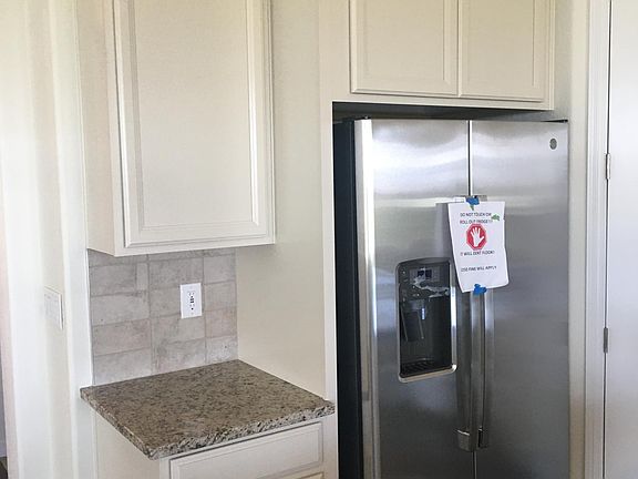 Ample cabinet space and spacious pantry.