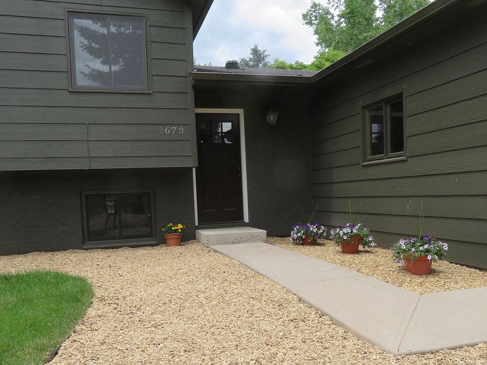 Beautiful entry with Mature Landscaping