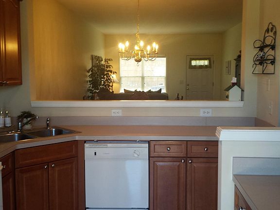 Kitchen with view on living room