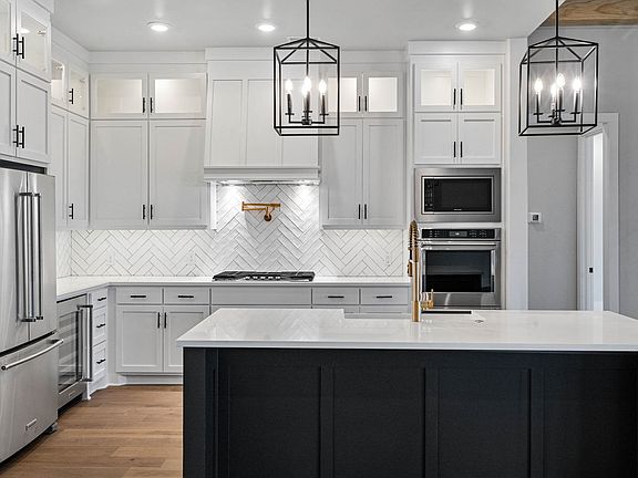 The Texoma has a large kitchen island with quartz countertops.