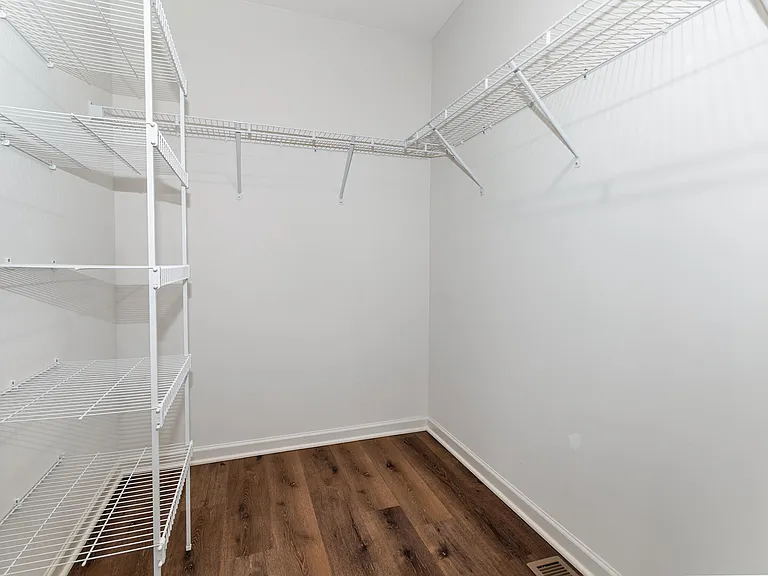 primary bedroom walk-in closet