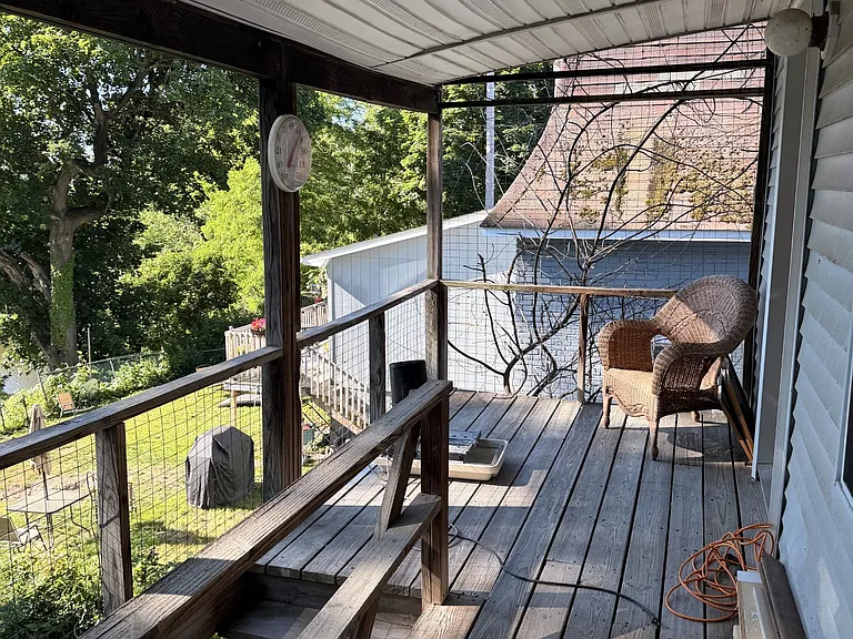 view of the sitting area for this unit on the balcony
