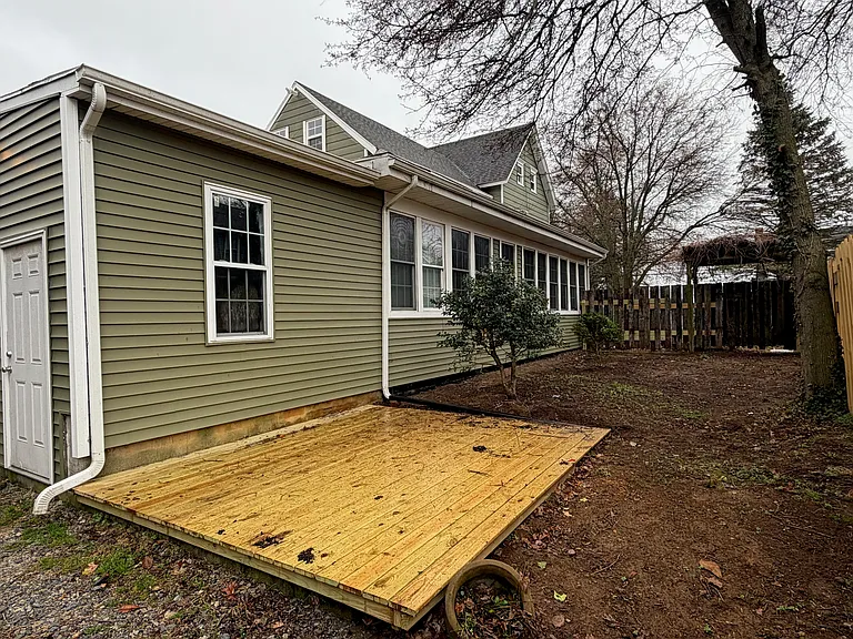 Downstairs apt side yard deck