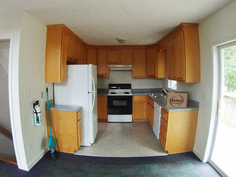 Compact Kitchen with Dishwasher, refrigerator, stove