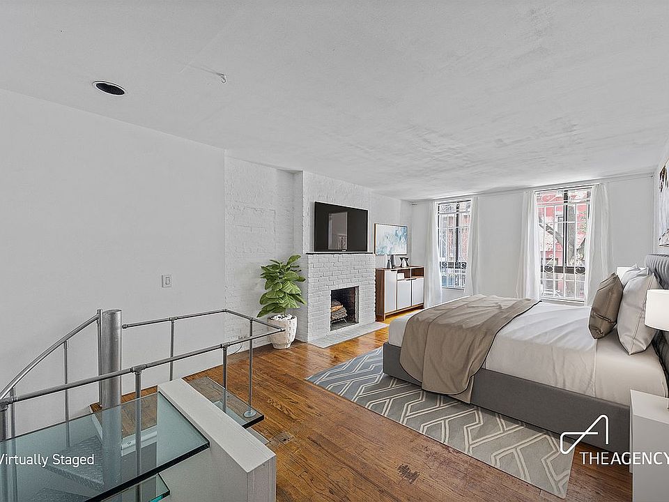 1st image of 418 1/2 E 9th St APT 1A