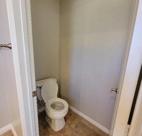 Separated toilet room inside the master bedroom