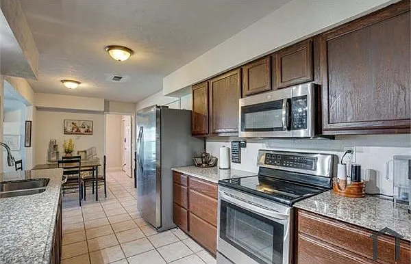 4701 Bayport Dr — Photo 5
