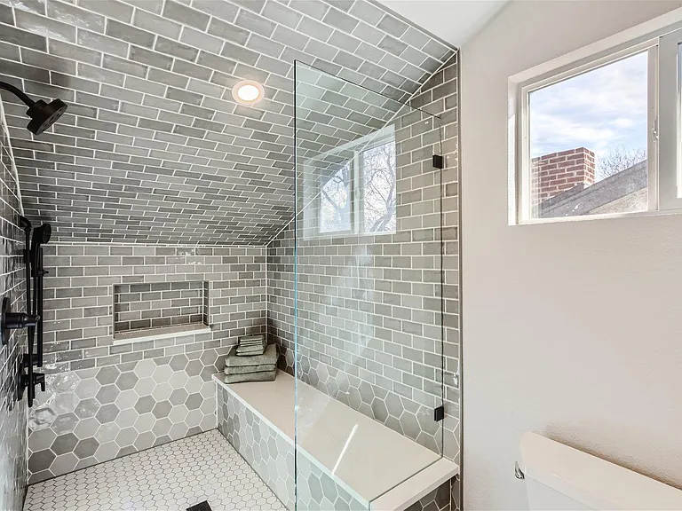 Brand new shower, dual heads, bench, lots of room