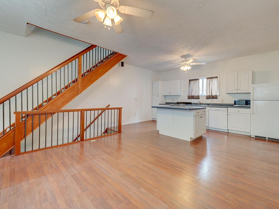 Living Room / Kitchen - microwave, stove, oven, and fridge included