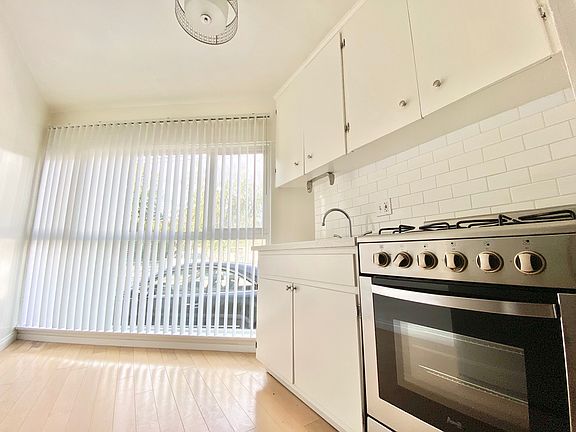 2nd image of 487 S Roxbury Dr #473