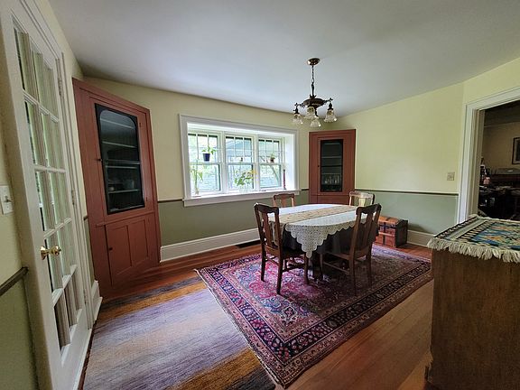 Dining room with built in cabinets