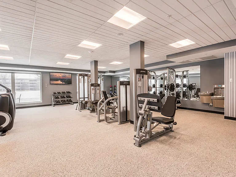 Our expansive fitness center feels like a true gym with cardio equipment, weightlifting machines and free weights.