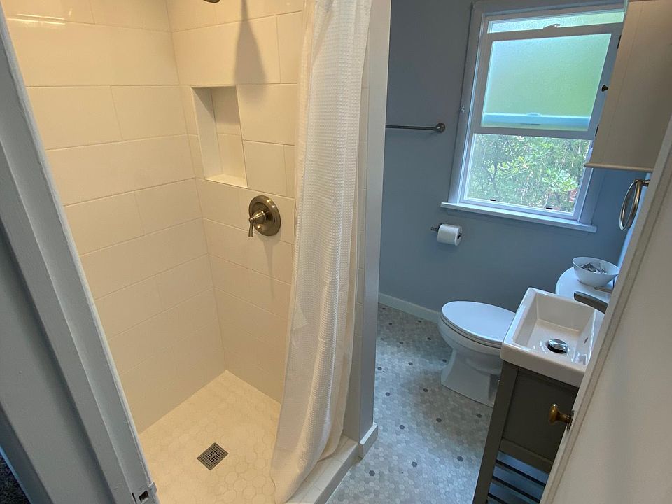 Bathroom with brand new tile shower