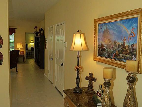 Foyer, Ceramic Tile extends through the Kitchen and Family Room.