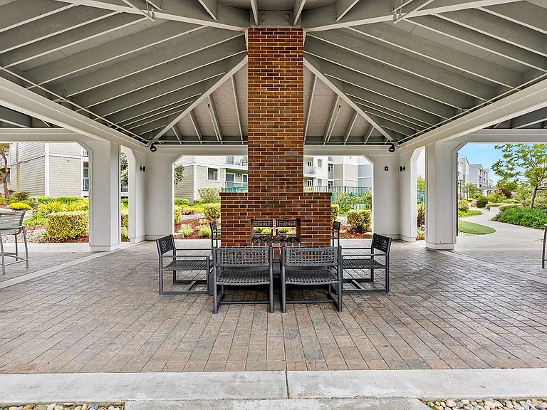 Relax with friends and neighbors at the outdoor barbecue area