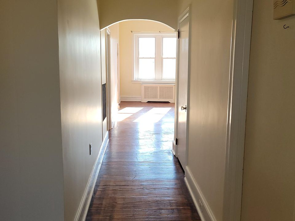 View from dining room to living room door on right is entry to apartment