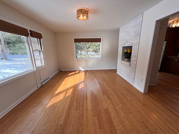 The living room flows seamlessly to the kitchen.