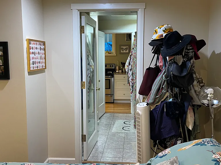 Bedroom through to kitchen