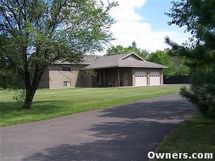 from driveway looking at front of house