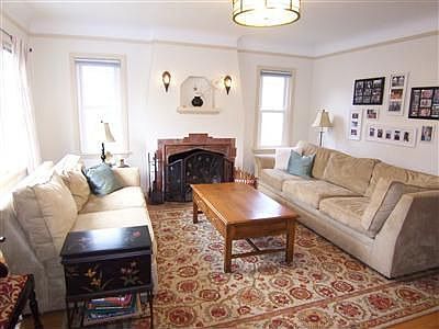 Lovewly formaal living and dining rooms. Hardwood floors and original trim, co