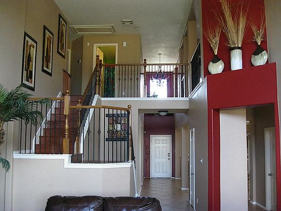 Look at this beautiful natural light that comes in from the 2 story windows