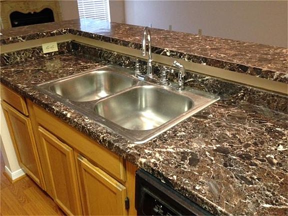 Kitchen has a good size with double sink