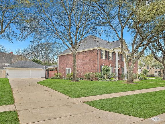 Oversized 3 car garage with tons of additional parking space.