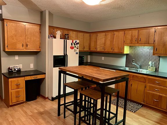 Kitchen desk. Fridge stays.