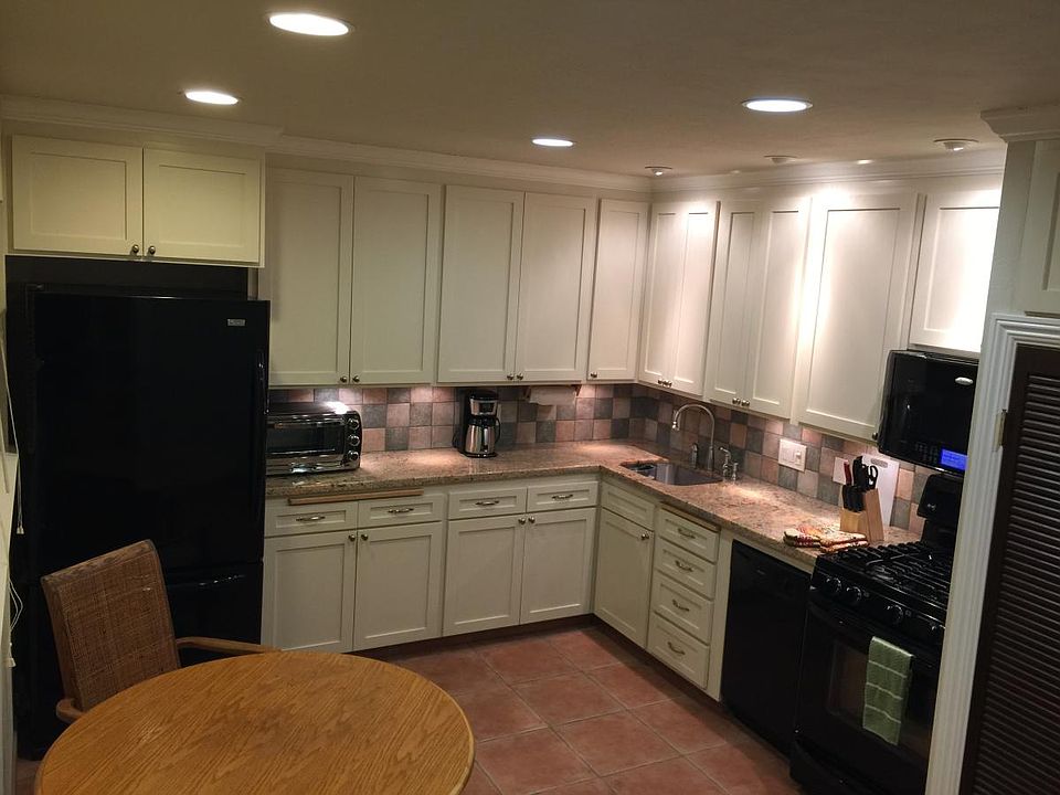 Granite Countertops, Italian Porcelain Tile, Recessed Lighti