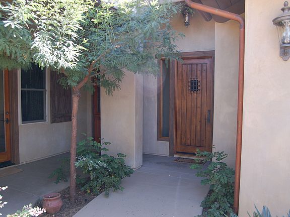 Welcome Home! Stucco finished in custom "aged wash"
