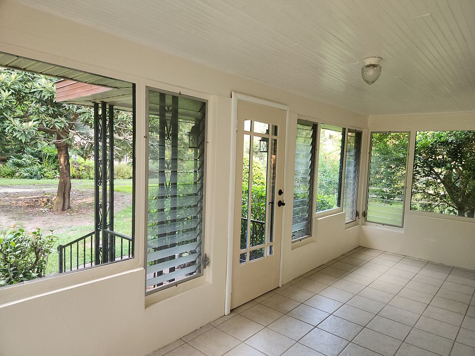 Large sunroom with a nice view and breeze.