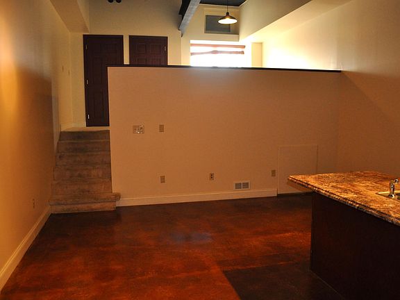 Small door on right below loft is access to huge storage area.