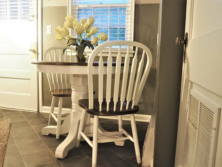 Dinette and door to fenced backyard