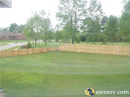 fence recently stained Sherwin Williams Cedar Mill color