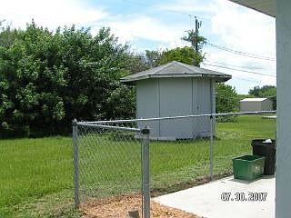 PARTIALLY FENCED WITH SHED
