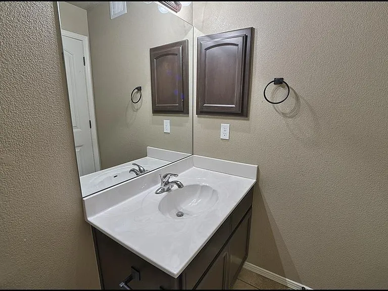 14302 Pancho Gonzalez Ct #A — Photo 23