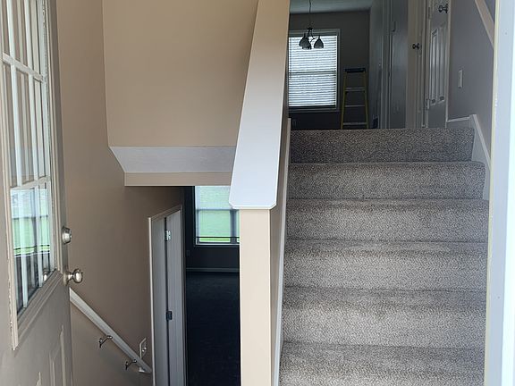 Front entry of duplex 6 steps up and 6 steps down