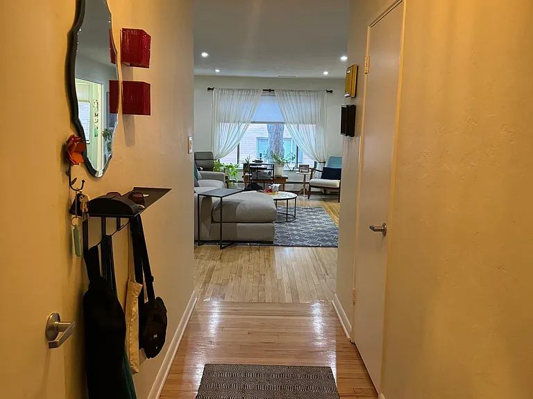 front entryway with laundry room/storage and coat closet