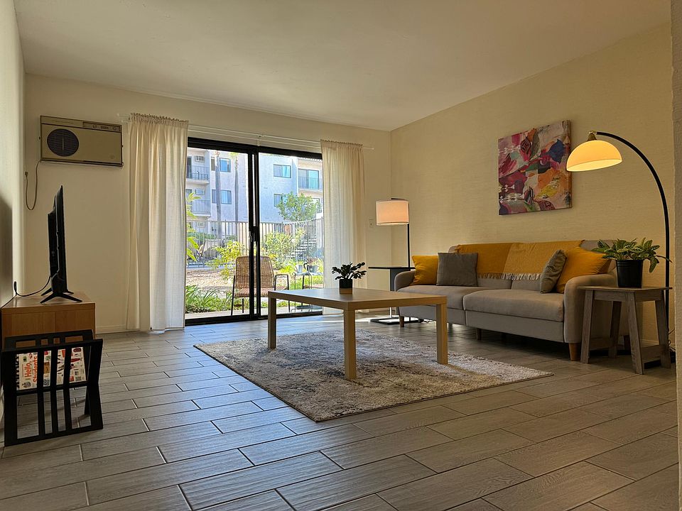 The living room has a natural warmth that will make you and your guests feel right at home.