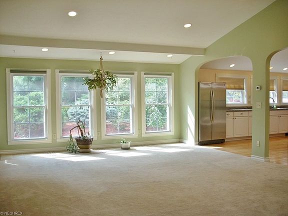 Great Room facing the south, open to the kitchen and dining room.