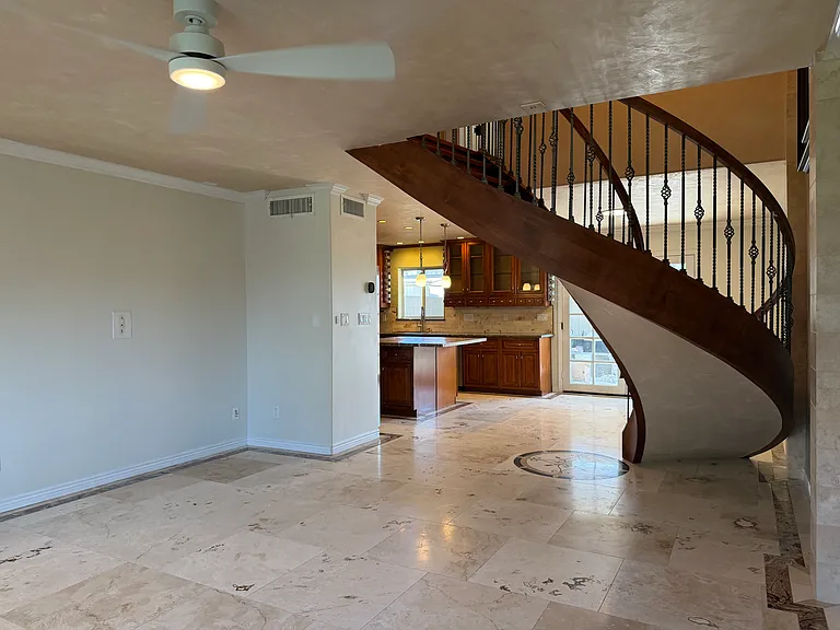 View of kitchen and expanded area from family room.