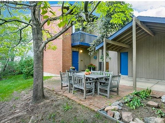 Front patio, car port, entry to town home and garage