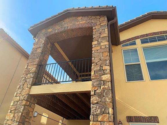 covered Trex deck at back of home