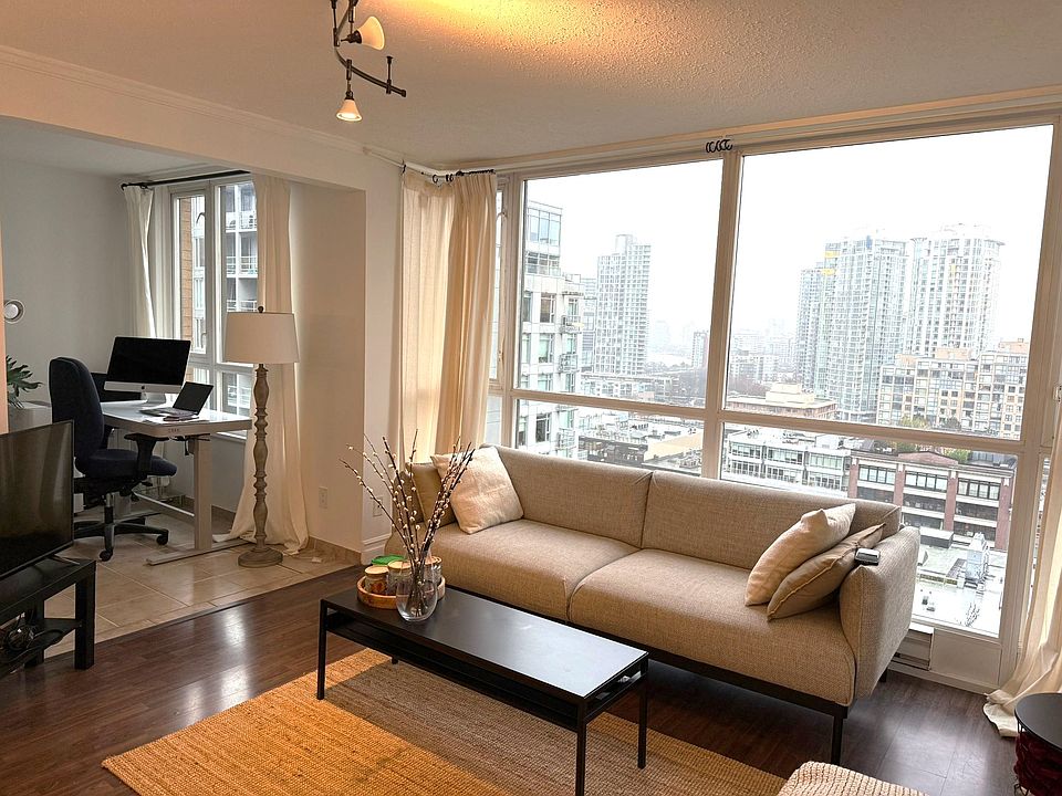 Living room looks into flex space