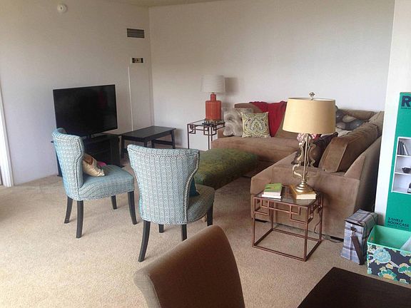 Partially furnished living room. Lots of space!