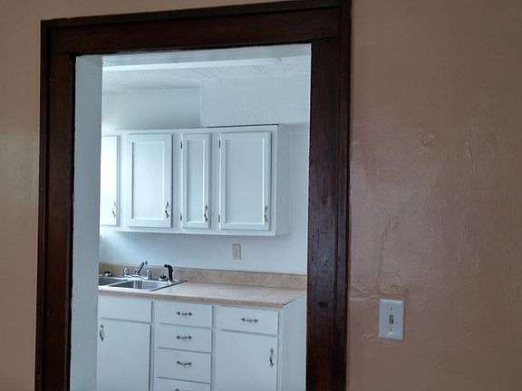 Kitchen with electric or gas stove hook-up.